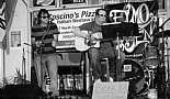 Coscino's Pizza's Free Mardi Gras Concert - February 2011 - Click to view photo 49 of 101. Mike Coscino (tambourine) and Chad Whaley (guitar, vocals). Coscino's Free Mardi Gras Concert, Mandeville, LA - February 26, 2011