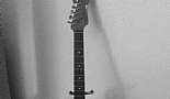 A Month in Paradise - Cayman Islands - August 2011 - Click to view photo 197 of 274. Bob's Fender Stratocaster