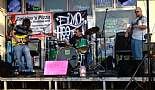 Mike Coscino (guitar, vocals), Billy Blanke (drums), Joseph DeDon (bass, vocals). Coscino's Free Mardi Gras Concert, Mandeville, LA - February 26, 2011