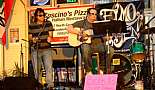 Mike Coscino (tambourine) and Chad Whaley (guitar, vocals). Coscino's Free Mardi Gras Concert, Mandeville, LA - February 26, 2011