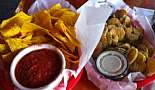 Food and Drink - Click to view photo 139 of 224. Chips, Salsa and Fried Pickles from The Beach House - Mandeville, LA